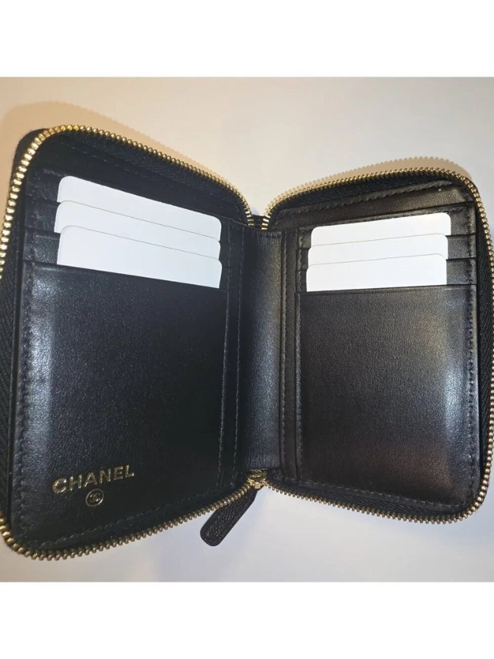 Authentic Chanel Small Zipped Pocket Wallet — Black Caviar Leather, Gold Hardwar